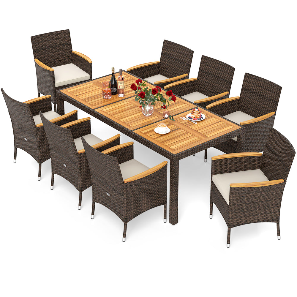 9-piece outdoor dining set featuring a beige acacia wood table top and brown PE rattan chairs with soft cushions.