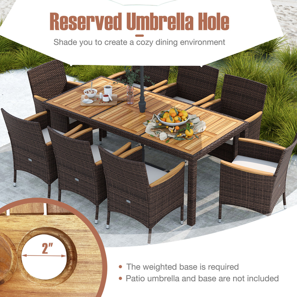 9-piece outdoor dining set featuring an acacia wood table top and brown PE rattan chairs with a 2" umbrella hole.
