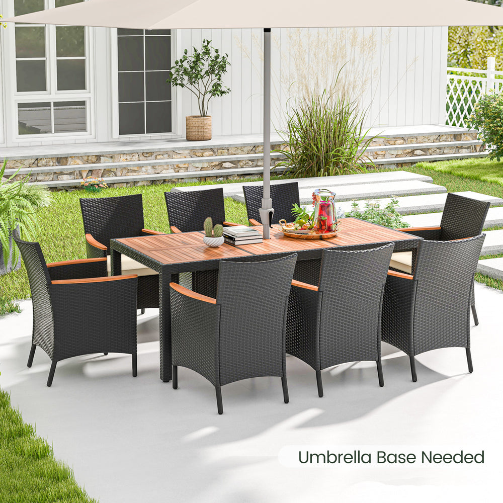 9-piece outdoor dining set featuring an acacia wood tabletop and supportive PE rattan chairs, perfect for patio dining.