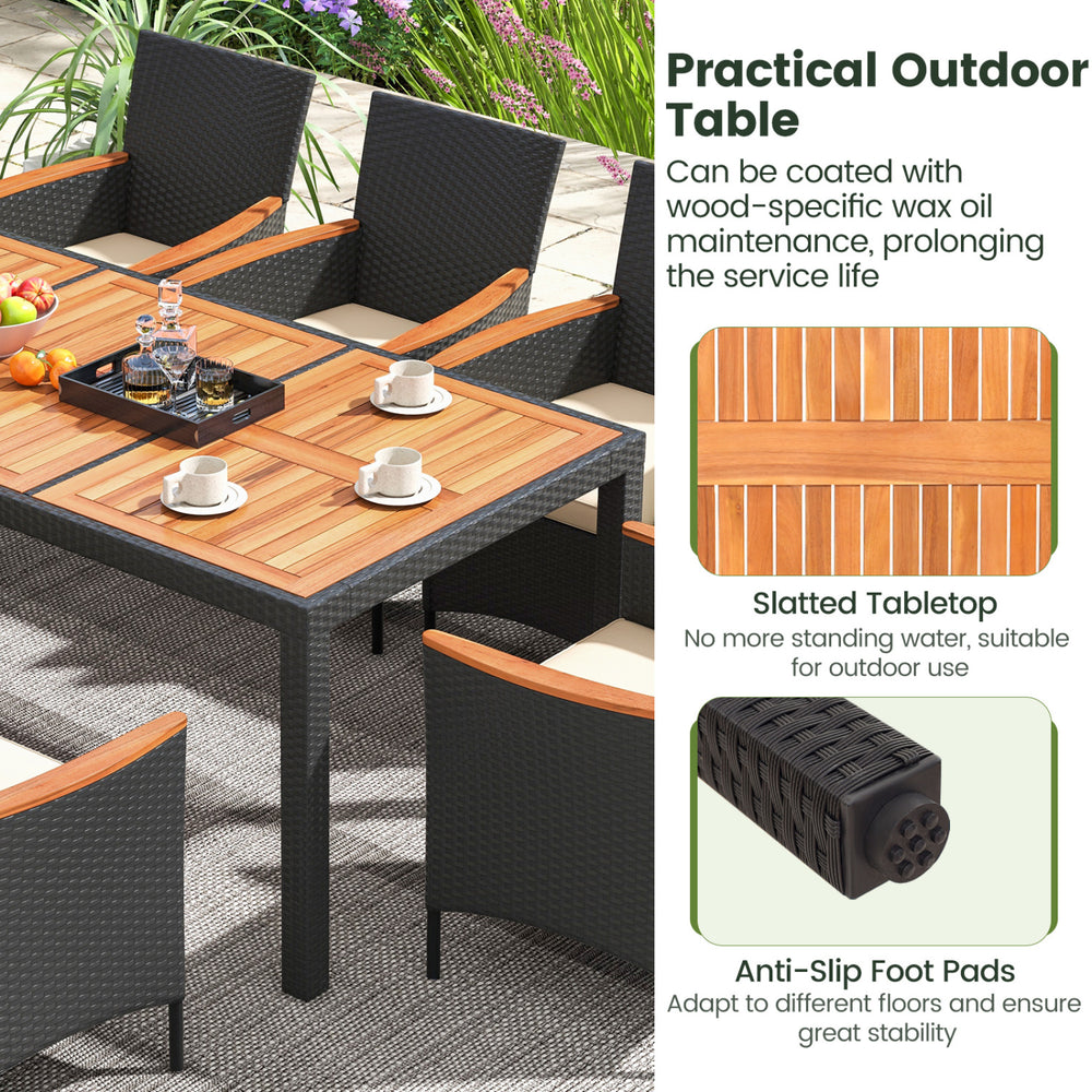 Outdoor dining table featuring a slatted acacia wood top and durable PE rattan, ideal for outdoor use and stability.
