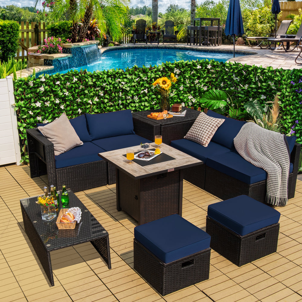 9-piece outdoor PE rattan wicker sectional sofa set with navy cushions and gas fire pit table for patio relaxation.