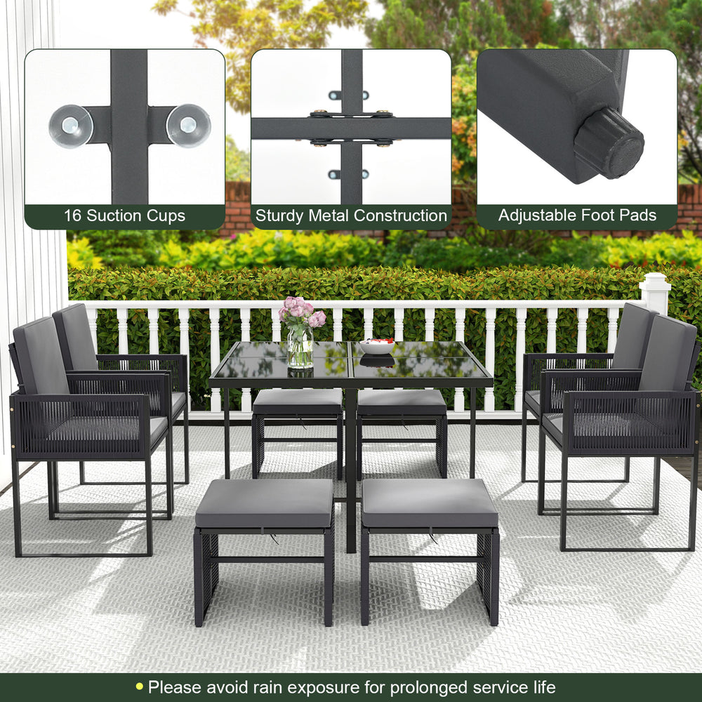 9-piece gray patio dining set featuring cushioned chairs and a tempered glass tabletop, perfect for outdoor gatherings.