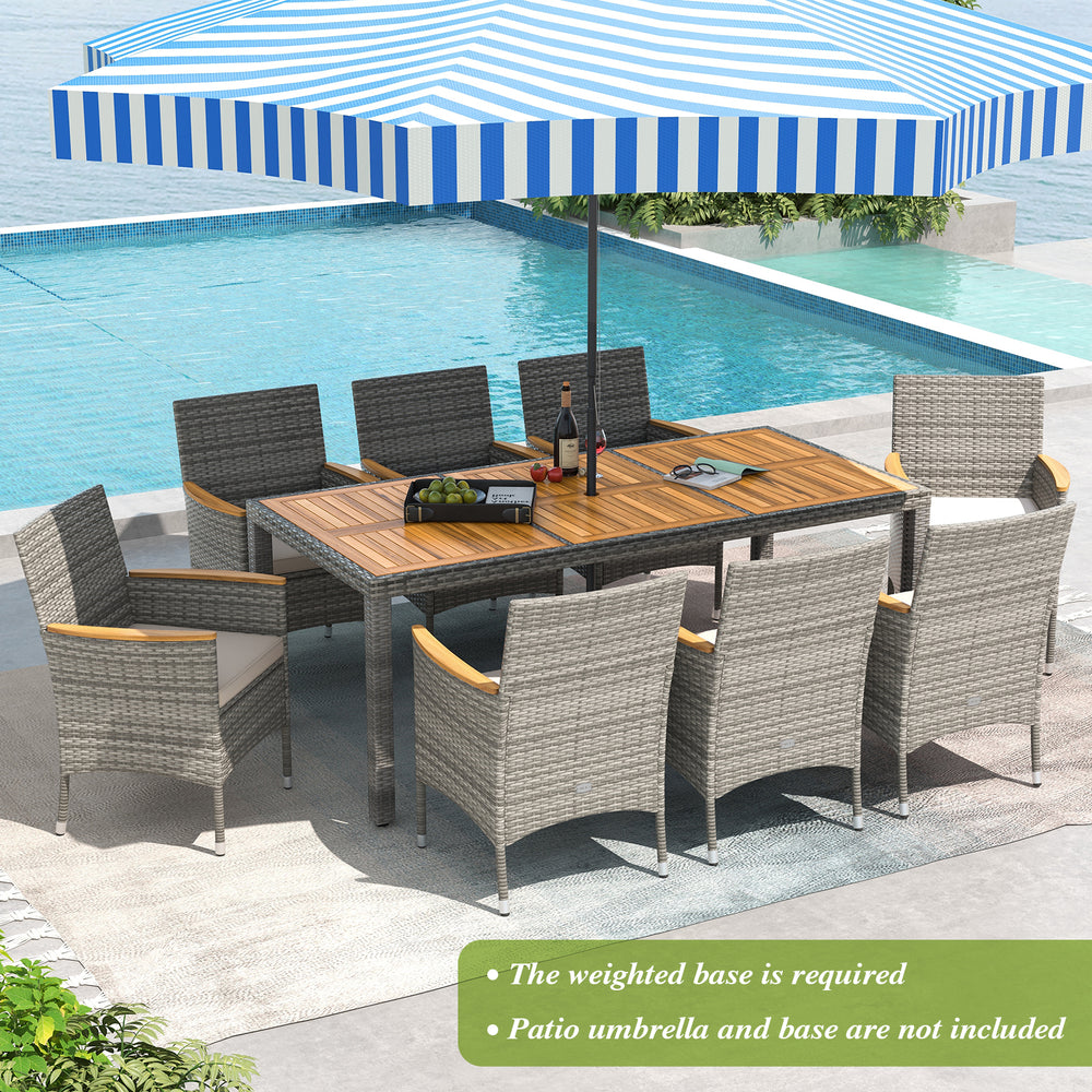 9-piece patio dining set featuring PE wicker chairs and acacia wood table, perfect for outdoor dining by the pool.