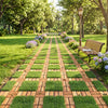 Acacia wood interlocking deck tiles with artificial grass create a natural path for outdoor spaces, ensuring easy installation.