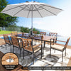 Acacia wood outdoor dining set with 8 chairs, featuring a spacious table and comfortable padded cushions for patio use.