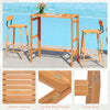 Acacia wood outdoor bar table with slatted tabletop, foldable design, ideal for balcony or poolside use.