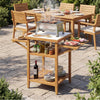Acacia wood outdoor grill table with faux marble top, featuring drop-leaf side panels and a two-tier open shelf.