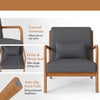 Accent chair with gray corduroy upholstery, curved armrests, and lumbar pillow for ergonomic comfort in any room.