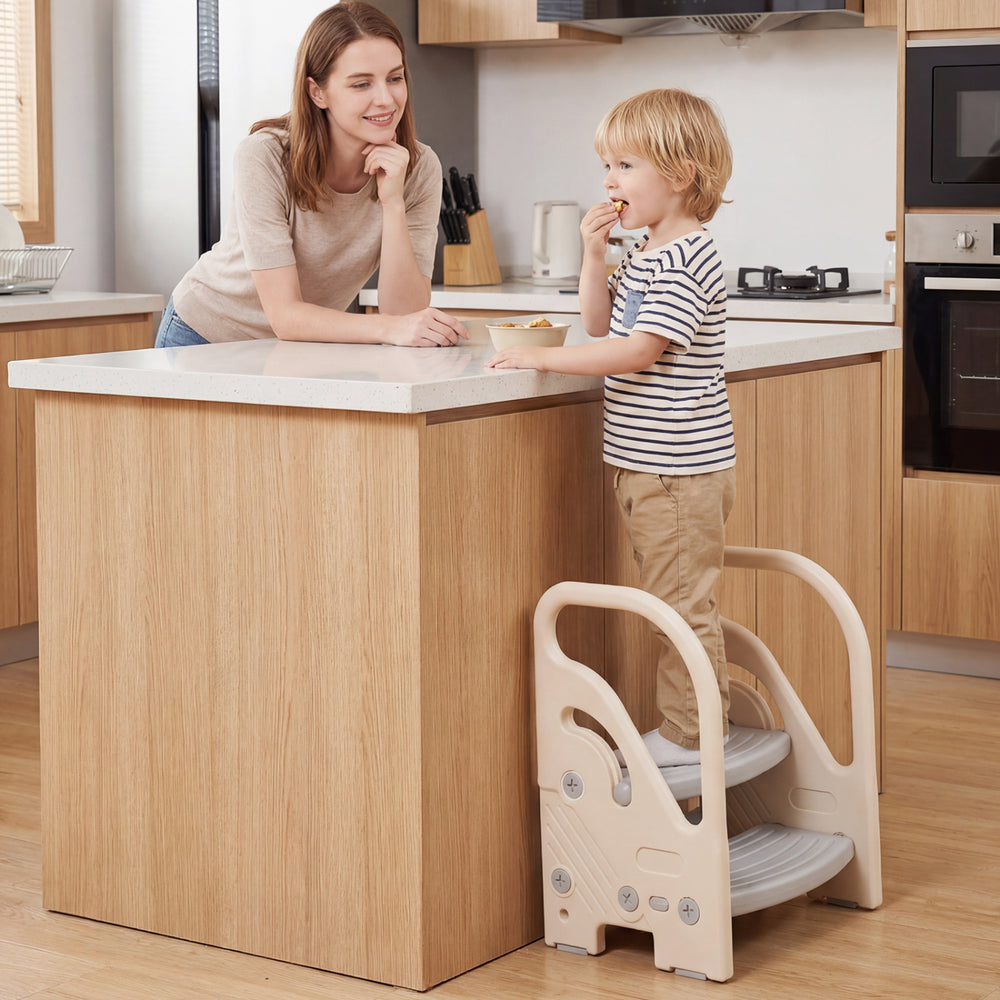 Adjustable 2-step kids helper stool in gray with safety handles, non-slip pads, ideal for reaching kitchen counters.