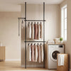 Adjustable black floor-to-ceiling clothes rack with two hanging rods, perfect for maximizing closet space and drying clothes indoors.