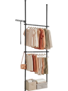 Adjustable black floor-to-ceiling clothes rack with two hanging rods, ideal for maximizing closet space and organization.