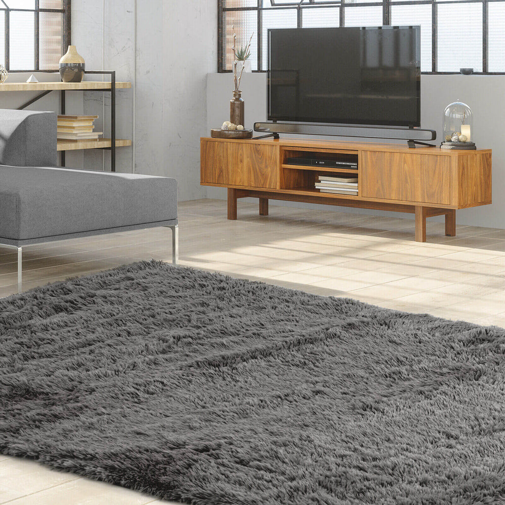 Gray 5 x 7 feet modern rectangular soft shag area rug with plush texture, perfect for cozy living room or bedroom.