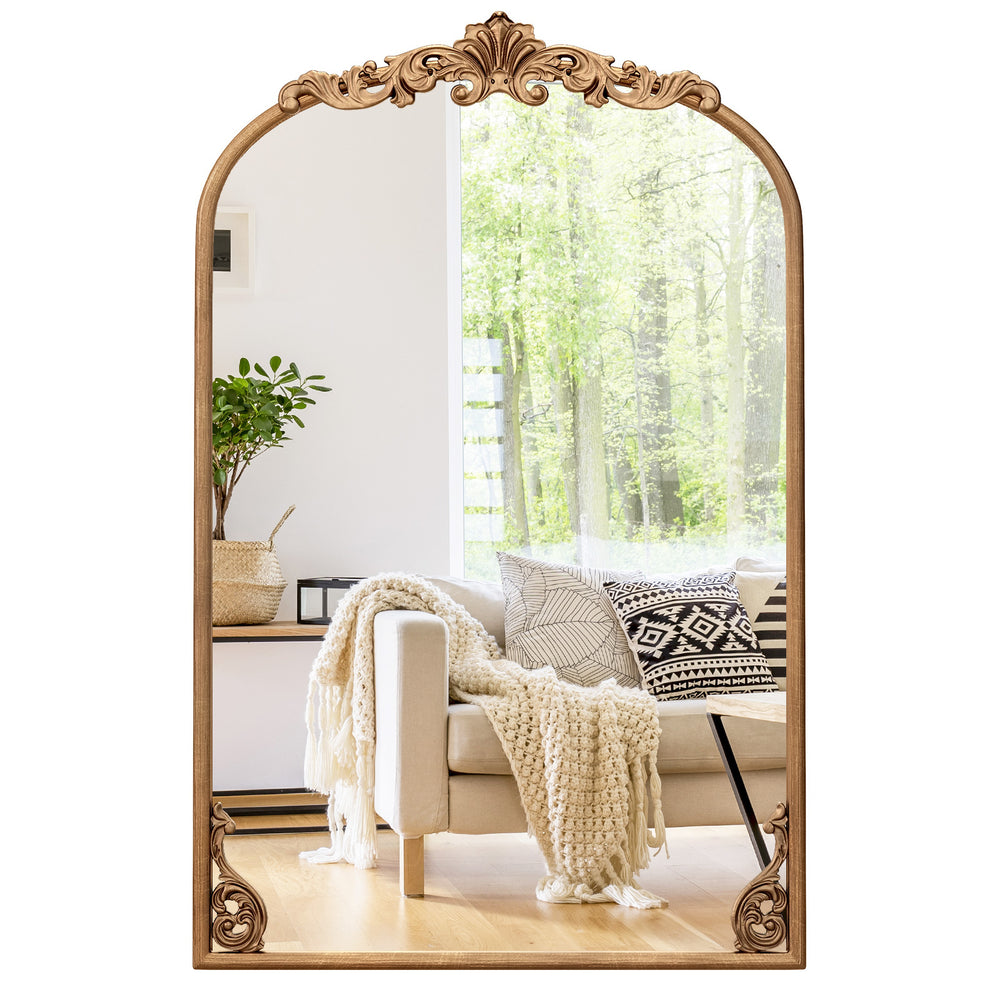 Arched gold vintage ornate mirror with a sturdy metal frame, perfect for enhancing entryways or living rooms.