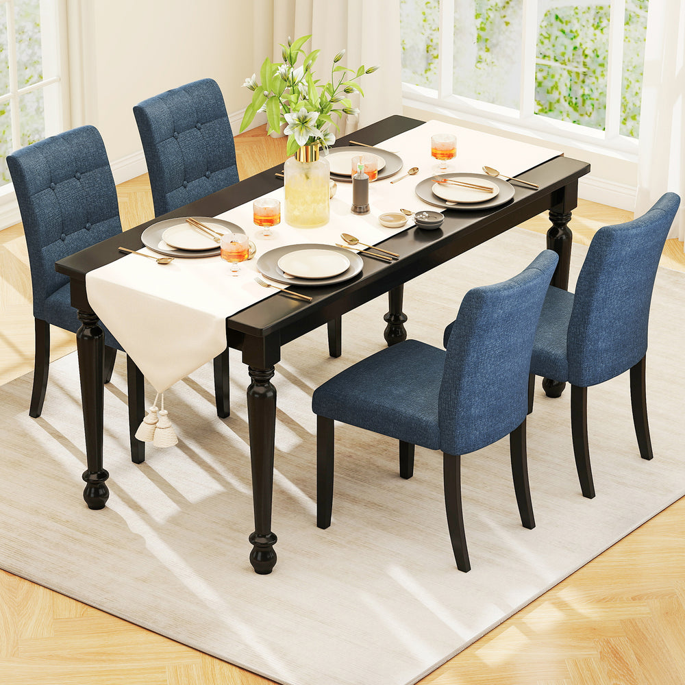 Elegant dark blue tufted dining chair with rubber wood legs, showcasing breathable fabric and stylish button detailing.