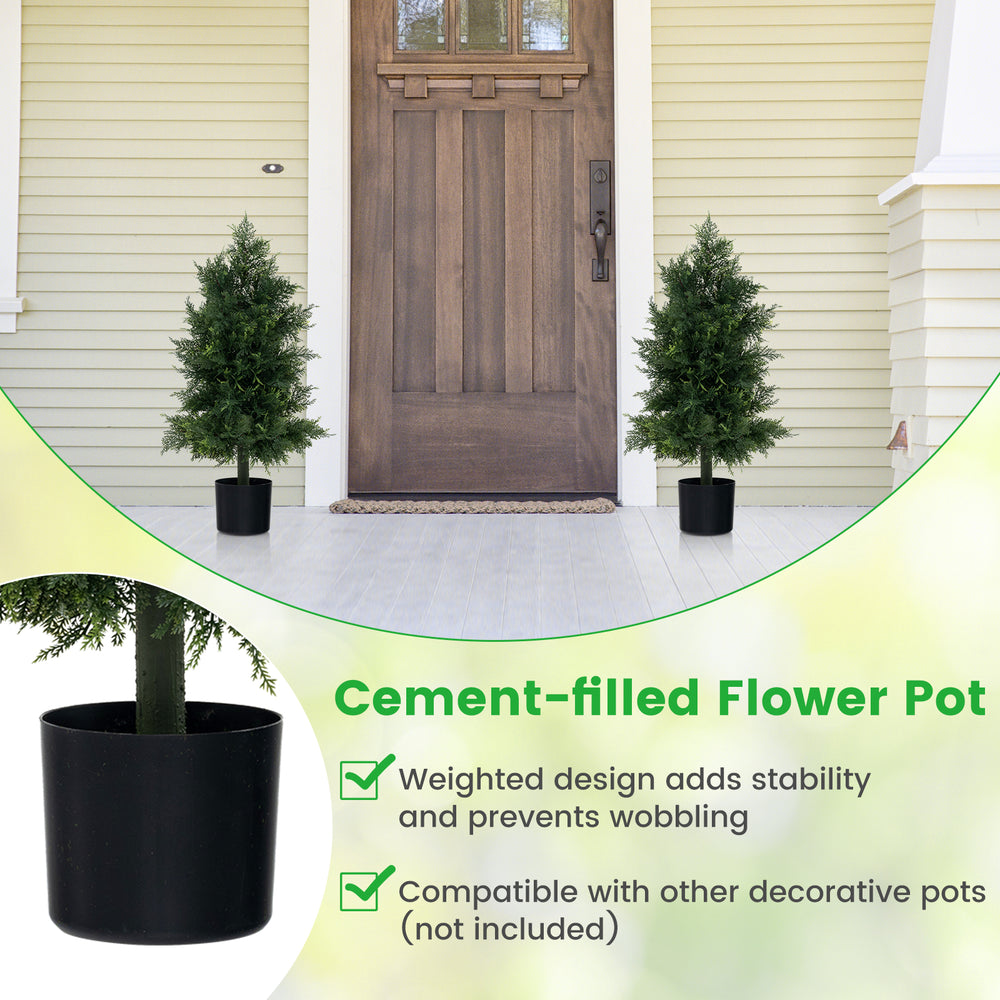Artificial cedar topiary tree in a cement-filled flower pot, providing stability for porch and office decoration.