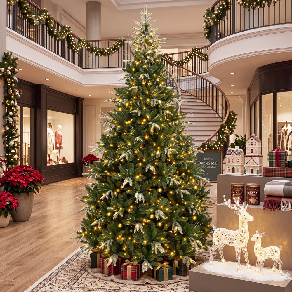 Lush 9-foot artificial Christmas tree with vibrant dual-color LED lights and a realistic full-bodied silhouette for holiday cheer.
