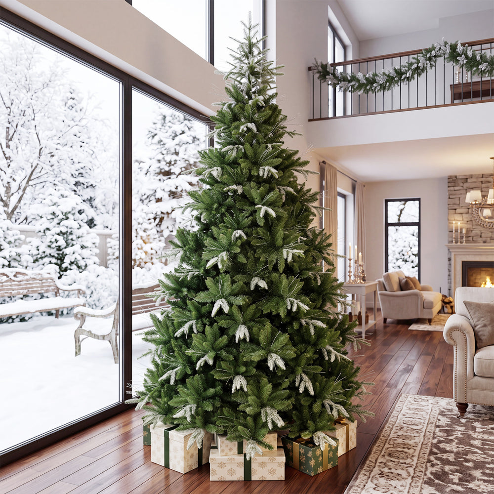 Artificial 9-foot Christmas tree with 3000 branch tips and dual-color LED lights, perfect for festive holiday decor.
