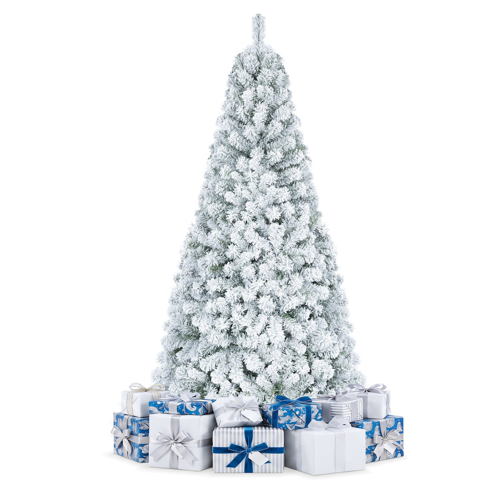 Snow-flocked 6 ft artificial Christmas tree with 1498 branch tips and surrounded by decorative blue and white gift boxes.