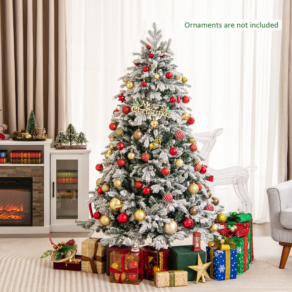 Flocked 6 ft Christmas tree with warm white LED lights, featuring lush branch tips and a stable metal stand for festive.