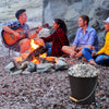 Black ash bucket with lid, brush, and cut-resistant gloves, perfect for bonfires and fire pits.