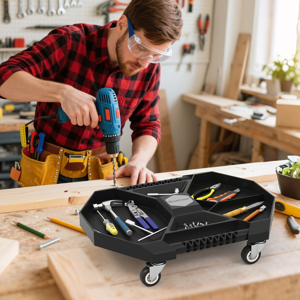 Automotive rolling tool creeper in black with 4 compartments and swivel casters, ideal for garages and workshops.