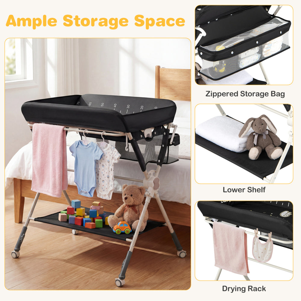 Foldable black baby changing table with zippered storage bag, lower shelf, and drying rack for convenient diaper.