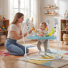 Baby Jump and Play Activity Center in blue, showcasing a child joyfully jumping with interactive toys for engaging.