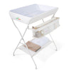 Foldable beige diaper changing table with side basket, waterproof PVC fabric, and height ruler for easy baby care.