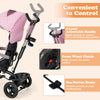 Adjustable push handle and front wheel clutch of the pink 4-in-1 baby trike for convenient control and safety.