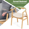 Bamboo accent chair with curved backrest and armrests, featuring a padded seat cushion for comfort and rustic style.