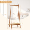 Bamboo clothes rack with hanging rod, rattan shelf, and copper hooks, ideal for entryway or bedroom storage.
