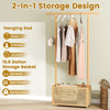 Bamboo clothes rack with hanging rod and 15.8-gallon rattan storage basket on wheels for versatile organization.