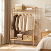 Bamboo clothing garment rack with hanging rod, two storage shelves, and side hooks, perfect for organizing your living space.