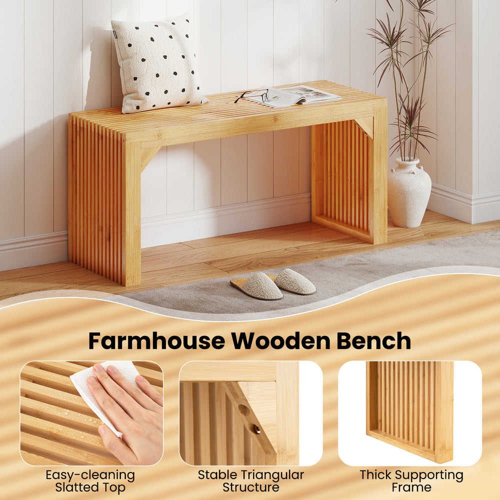 Bamboo dining bench with slatted top, stable triangular structure, ideal for indoor and outdoor use.