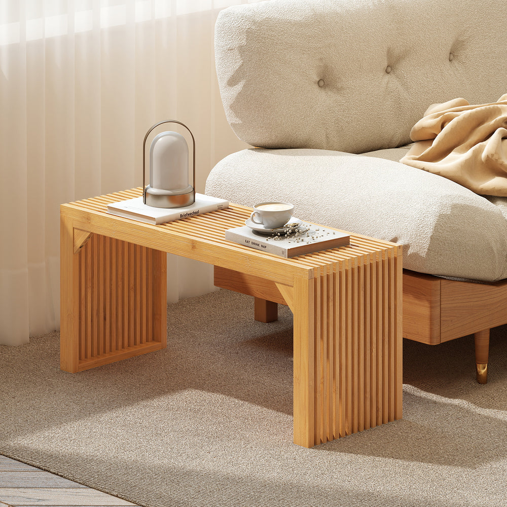 Bamboo dining bench with slatted top, 36" long, ideal for indoor or outdoor use, adding sophistication to any space.