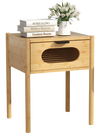 Bamboo nightstand with a decorated drawer and spacious tabletop, perfect for modern bedroom decor and easy cleaning.