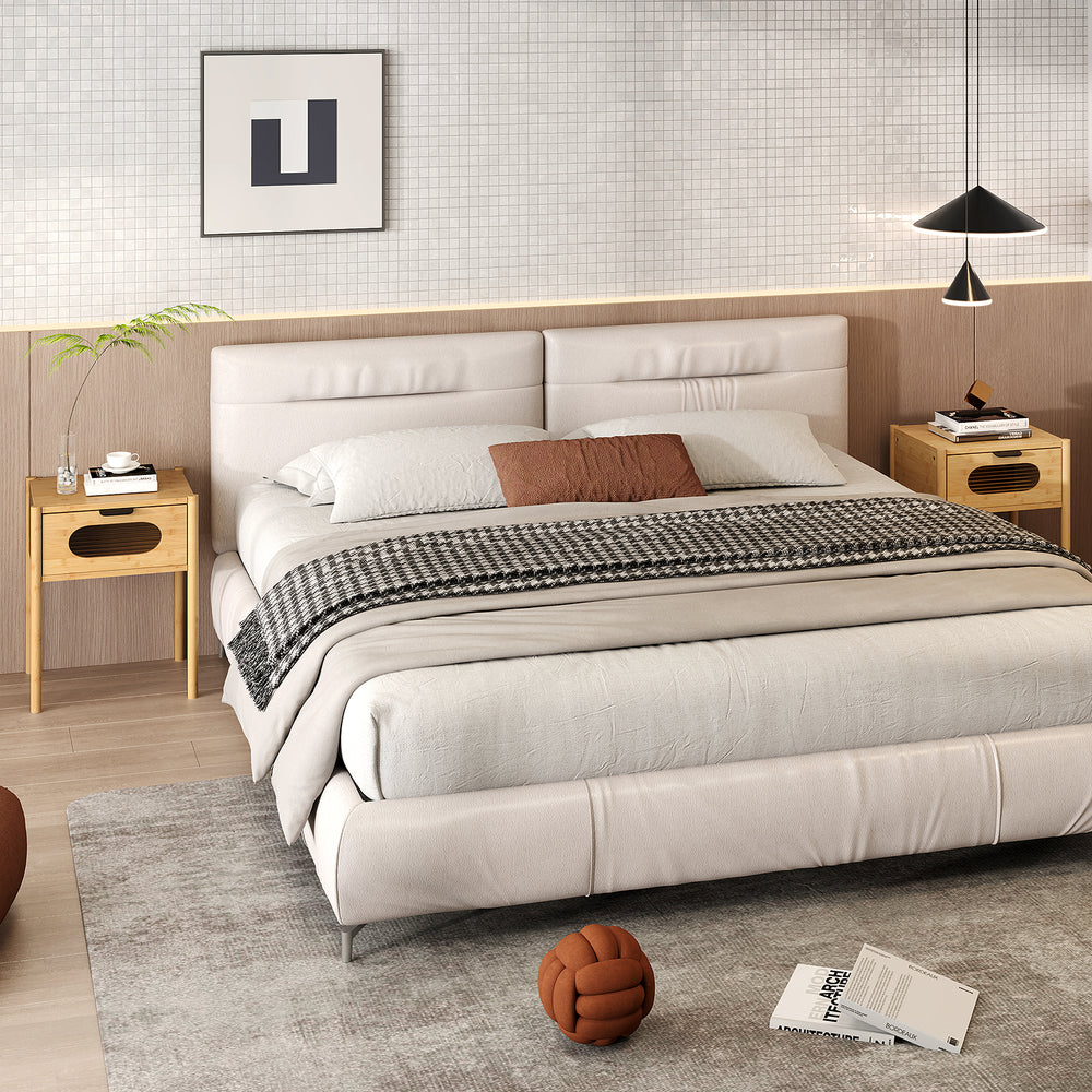 Bamboo nightstand with decorated drawer, sleek surface, and modern metal handle for stylish bedroom storage.