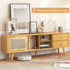 Bamboo TV stand with rattan and glass doors, featuring 2 drawers and 5 elevated legs for easy cleaning and storage.