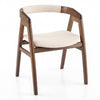 Bamboo upholstered dining chair with curved back and armrests, walnut finish, ideal for dining rooms and living spaces.