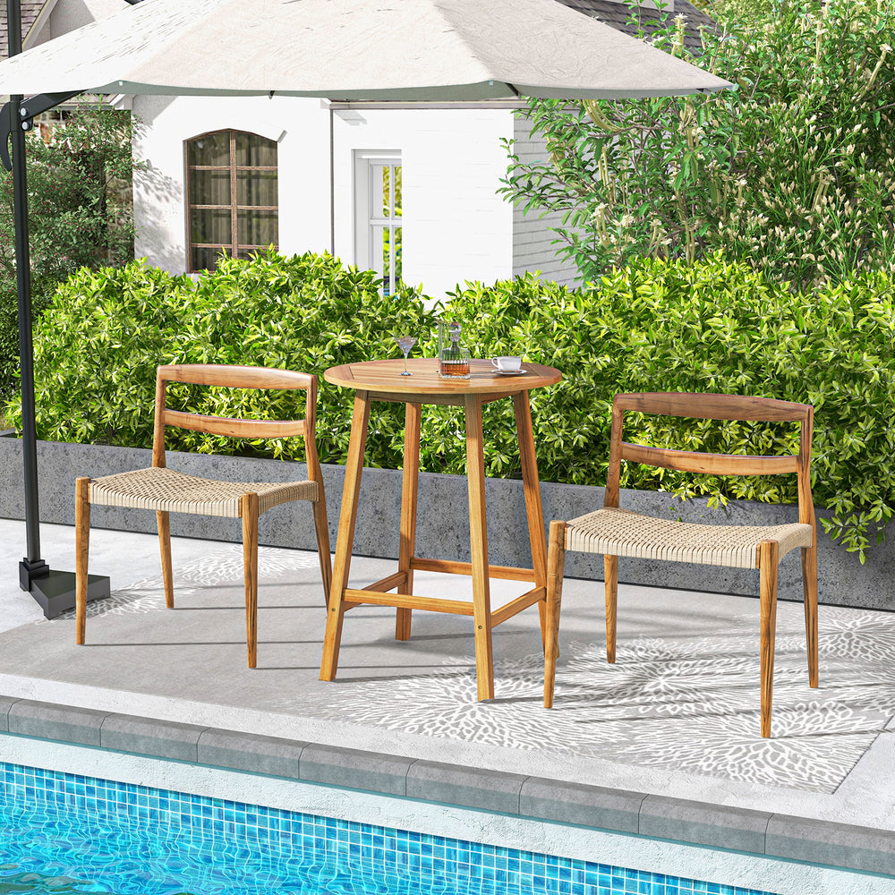 Bar height table with slatted tabletop and umbrella hole, made of durable acacia wood, ideal for outdoor patio use.