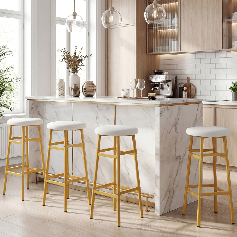 Backless bar stools with sturdy metal frame and footrest, featuring white linen fabric, ideal for kitchen islands.