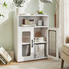 White freestanding bathroom cabinet featuring a stylish design, two doors, and visible adjustable shelves for versatile.