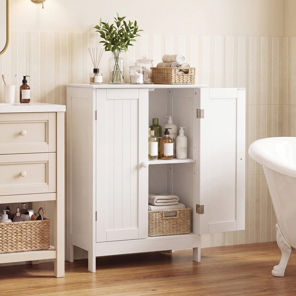 Elegant white bathroom floor storage cabinet with double doors and two shelves for organized toiletries and essentials.