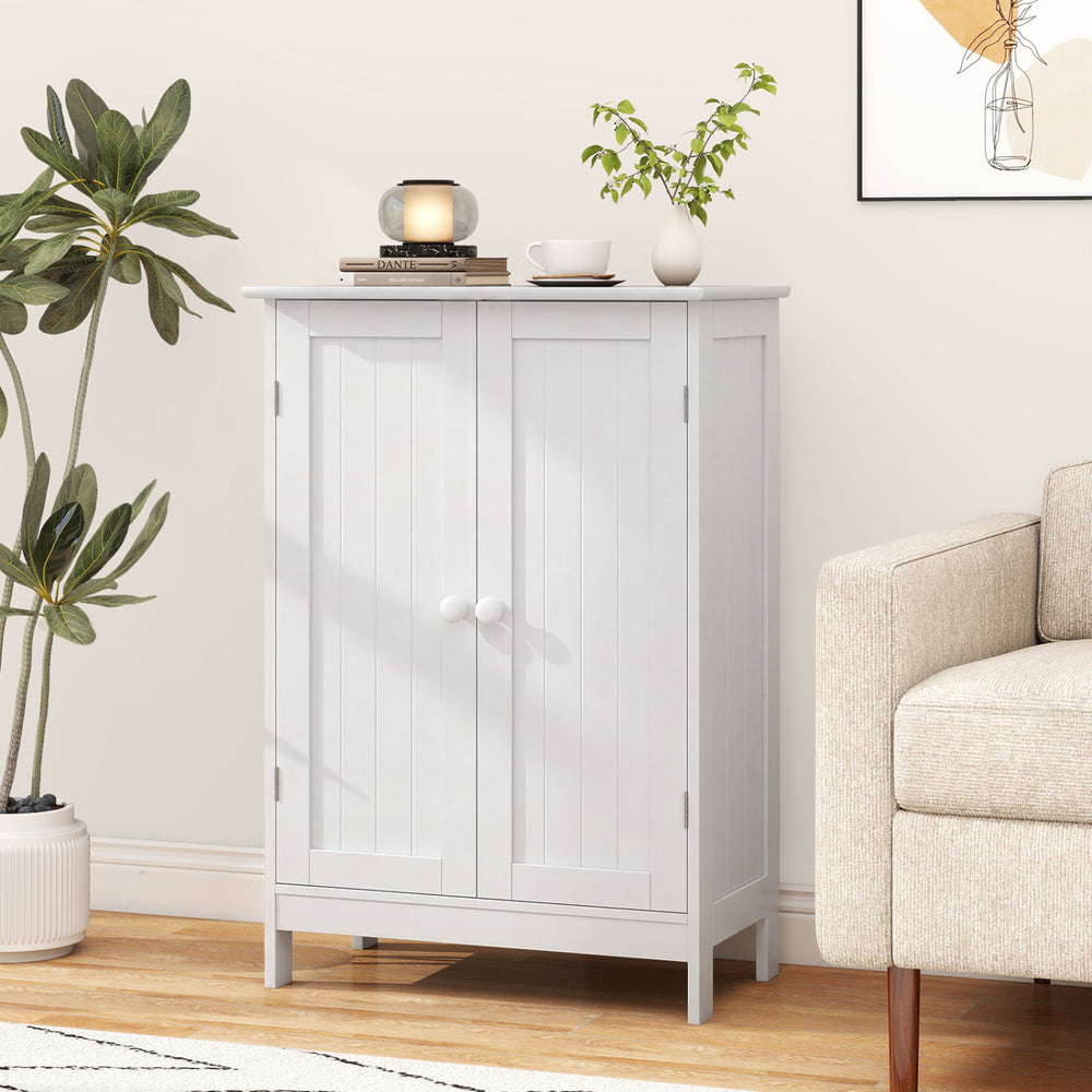 Elegant white bathroom floor storage cabinet with double doors and two shelves, perfect for organizing toiletries and essentials.