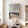 Wall-mounted grey bathroom cabinet with towel bars, featuring two doors and open shelves for storage.