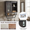 Bathroom wall cabinet with sliding barn door, black finish, 3-tier storage, and metal hanging bar with hooks for towels.