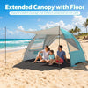 Beach tent sun shelter in blue with extended floor and canopy, offering UPF50+ protection for family comfort on the.