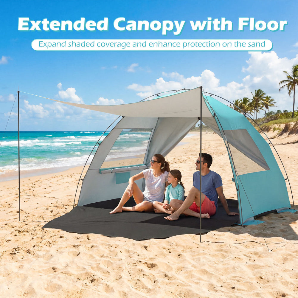 Beach tent sun shelter in blue with extended floor and canopy, offering UPF50+ protection for family comfort on the.