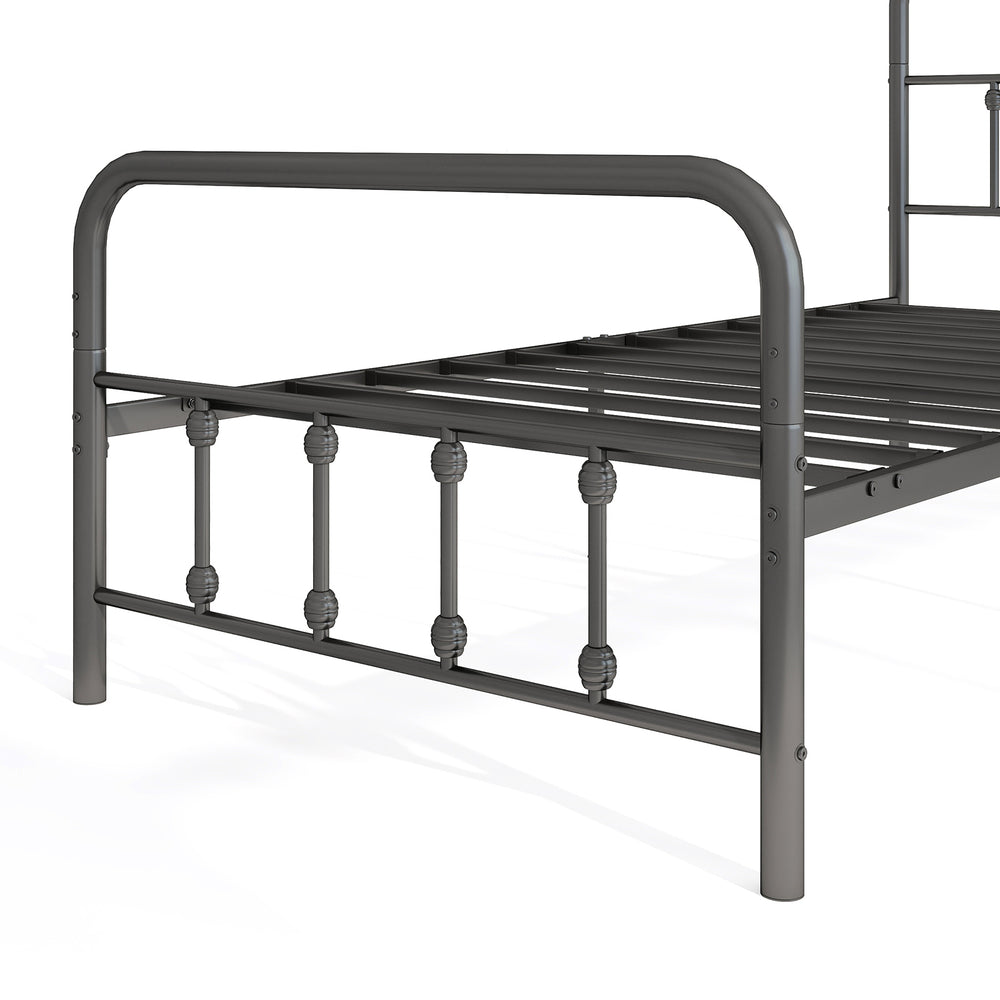 Close-up of the black twin bed frame with headboard, featuring robust metal slats and under bed storage space.