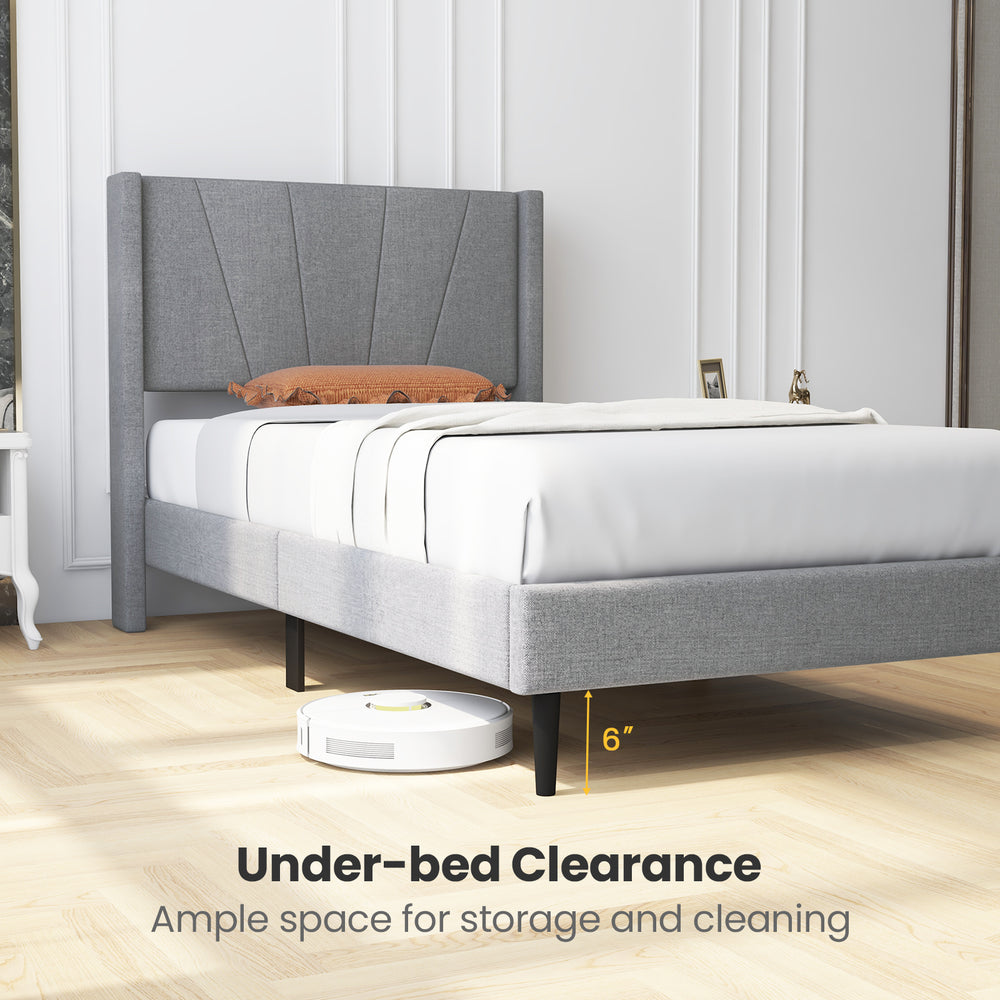 Twin/Queen bed frame with linen upholstered wingback headboard and 6" under-bed clearance for storage and cleaning.